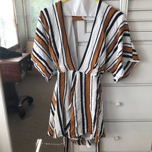 Romper-Akira. Easy to dress up/ beach cover up.